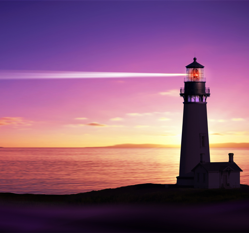 Lighthouse with sunset on the water
