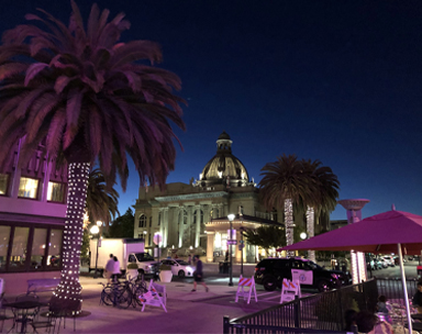 San Mateo County History Museum at night, purple lighting